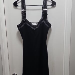 Moschino Black and White Stitch Detail. Has never been worn